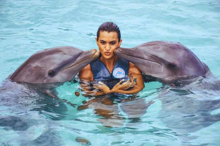 Girl-with-dolphin-Punta-Cana