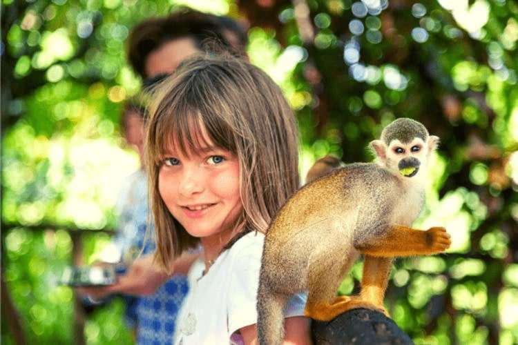 Girl-and-monkey-Punta-Cana