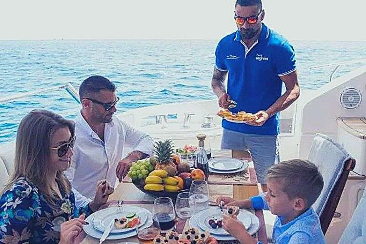 Family-dining-on-the-yacht-Tigresa