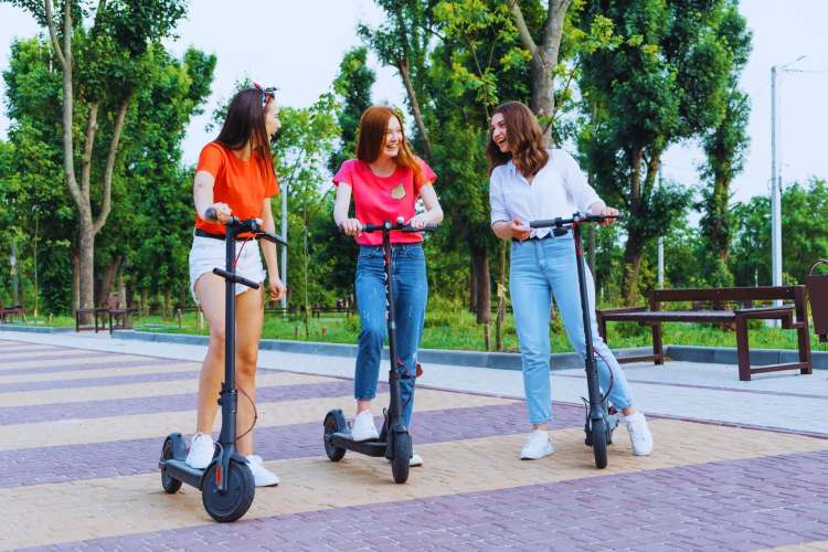 Group-of-girls-on-electric-scooters