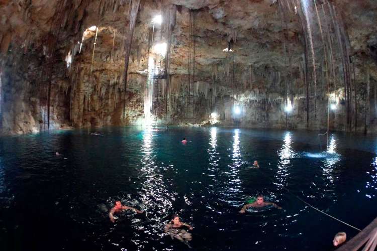 Tourists-Swimming-in-a-Cenote