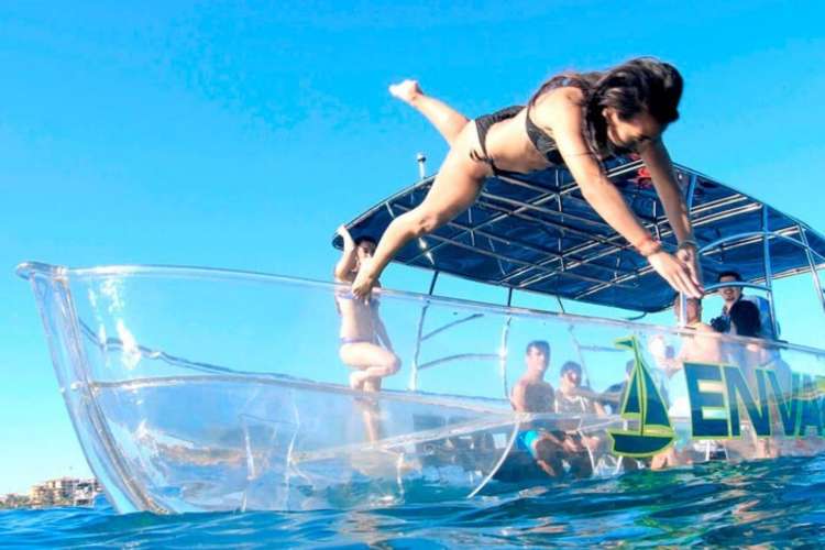 Jump-from-a-transparent-boat-on-the-coast-of-Cozumel