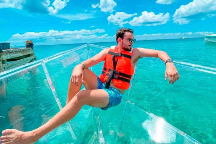Guy-on-a-glass-bottom-boat-in-Cozumel