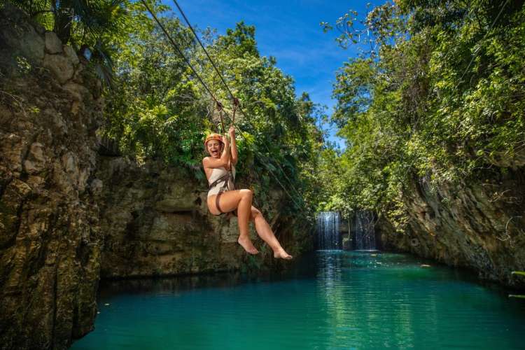 Zip-lining-over-water-at-Xplor-Park